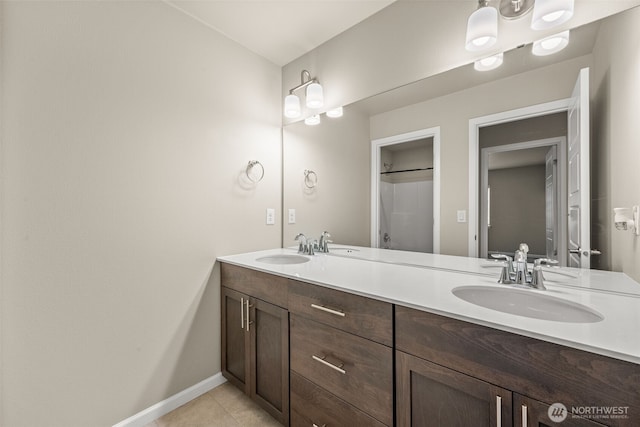 32904 SE Stevens St, Black Diamond, WA 98010 - full bath with baseboards, double vanity, a sink, and tile patterned floors
