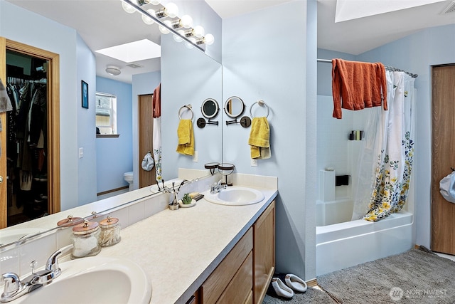 13328 67th Ave E, Puyallup, WA 98373 - bathroom with shower / bath combo, double vanity, a sink, and toilet