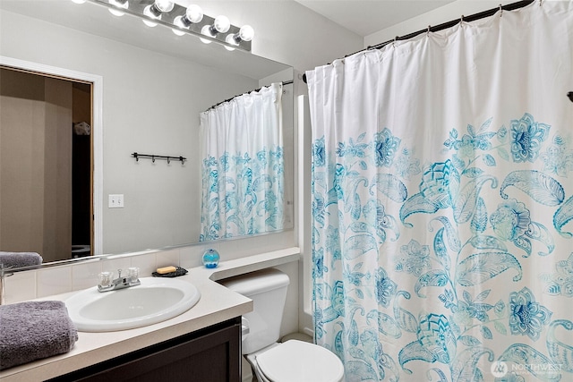 13328 67th Ave E, Puyallup, WA 98373 - bathroom featuring toilet, vanity, and a shower with curtain