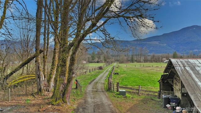 property view of mountains featuring a rural view