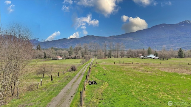 view of mountain feature with a rural view