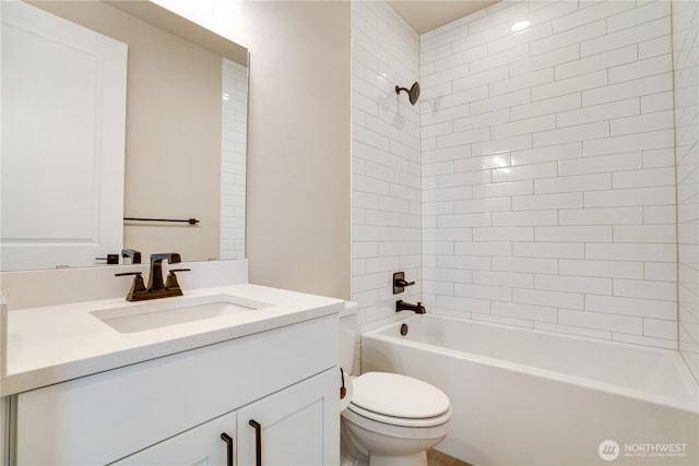 bathroom with toilet, vanity, and bathtub / shower combination