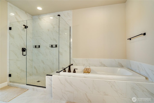 full bathroom featuring a bath, a marble finish shower, recessed lighting, and marble finish floor