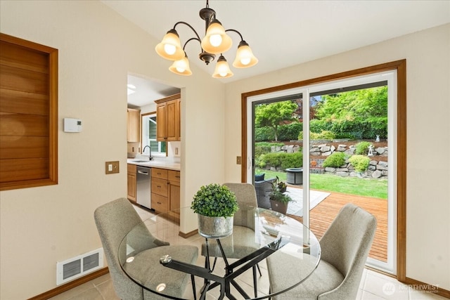 1129 235th Pl SW, Bothell, WA 98021 - dining area with a chandelier, baseboards, and light tile patterned flooring