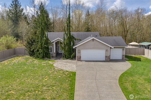 ranch-style home featuring a front yard, stone siding, a garage, and concrete driveway