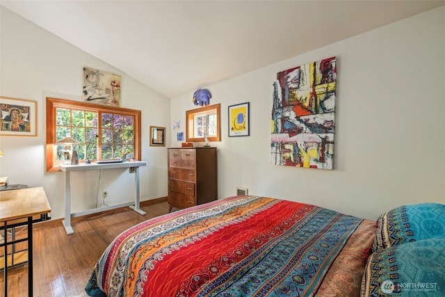3404 Oysterville Rd, Oysterville, WA 98641 - bedroom with visible vents, baseboards, lofted ceiling, and wood finished floors