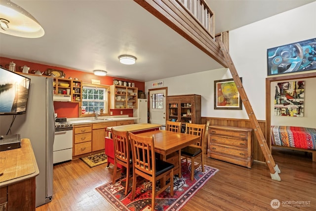 3404 Oysterville Rd, Oysterville, WA 98641 - dining space featuring a wainscoted wall and light wood-type flooring