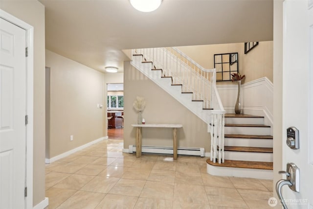 24010 SE 168th St, Issaquah, WA 98027 - foyer featuring a baseboard radiator, stairs, tile patterned flooring, and baseboards