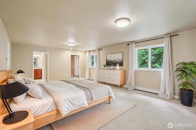 24010 SE 168th St, Issaquah, WA 98027 - bedroom with a baseboard radiator, light carpet, ensuite bath, and baseboards