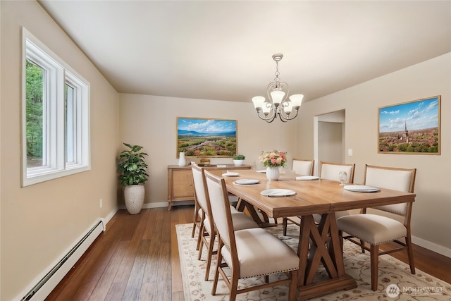 24010 SE 168th St, Issaquah, WA 98027 - dining area with a baseboard heating unit, a chandelier, light wood finished floors, and baseboards