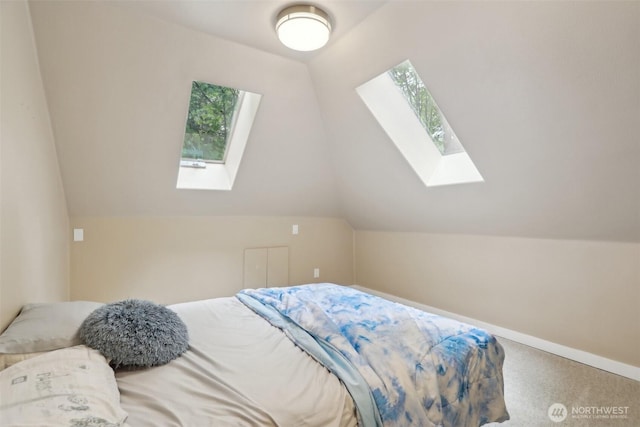24010 SE 168th St, Issaquah, WA 98027 - carpeted bedroom featuring a skylight, vaulted ceiling, and baseboards