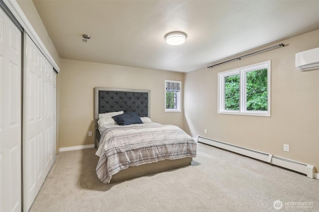 24010 SE 168th St, Issaquah, WA 98027 - bedroom with a baseboard heating unit, carpet, a closet, a wall mounted air conditioner, and baseboards