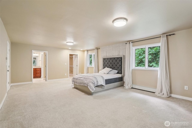 24010 SE 168th St, Issaquah, WA 98027 - carpeted bedroom with a baseboard heating unit, baseboards, a walk in closet, and connected bathroom
