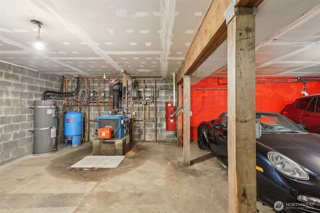 24010 SE 168th St, Issaquah, WA 98027 - unfinished below grade area featuring secured water heater, a water pressure tank, concrete block wall, and a heating unit