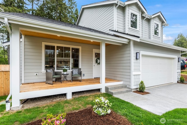 19713 17th St SW, Lakebay, WA 98349 - view of front of property with a garage, a porch, and driveway