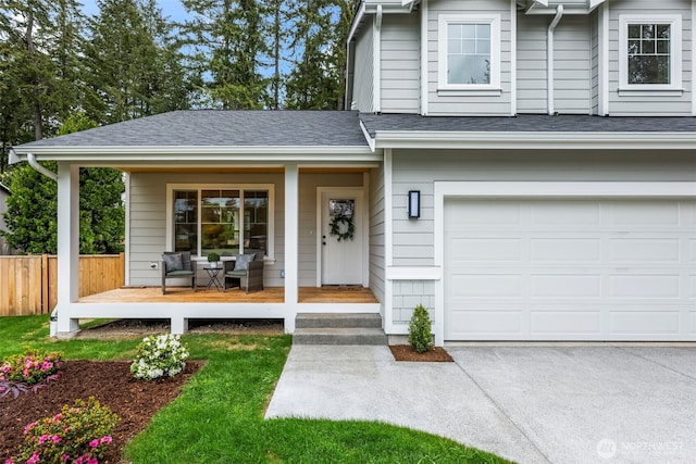 19713 17th St SW, Lakebay, WA 98349 - view of front facade with covered porch, roof with shingles, an attached garage, and driveway