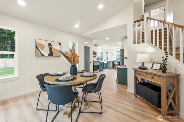 19713 17th St SW, Lakebay, WA 98349 - dining room with stairs, recessed lighting, lofted ceiling, light wood-style floors, and baseboards
