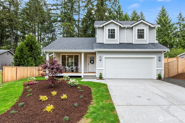 19713 17th St SW, Lakebay, WA 98349 - traditional home featuring covered porch, driveway, a garage, and roof with shingles