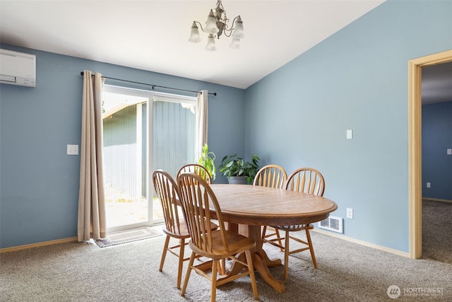 231 E Heights Pl N, Belfair, WA 98528 - carpeted dining room with a chandelier, healthy amount of natural light, and a wall mounted air conditioner