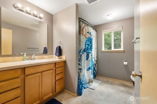 231 E Heights Pl N, Belfair, WA 98528 - bathroom featuring vanity and a shower with shower curtain