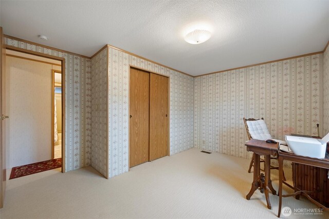 1340 Gloria Ln, Walla Walla, WA 99362 - carpeted home office with a textured ceiling, wallpapered walls, and crown molding