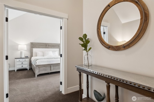211 Market St, Pacific Beach, WA 98571 - bedroom featuring baseboards and dark colored carpet