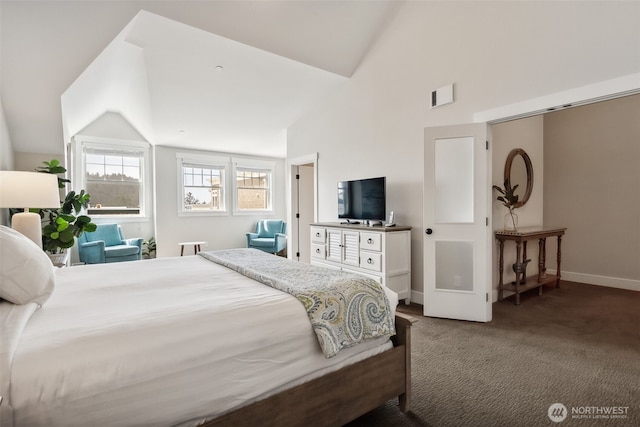 211 Market St, Pacific Beach, WA 98571 - bedroom with dark colored carpet, visible vents, baseboards, and lofted ceiling