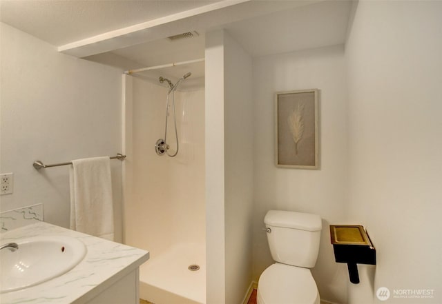 9807 S Lake Stevens Rd, Lake Stevens, WA 98258 - bathroom featuring a shower stall, toilet, and vanity