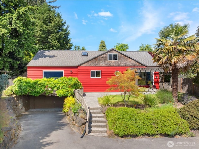 3754 SW 107th St, Seattle, WA 98146 - view of front of property featuring a garage, asphalt driveway, and a shingled roof