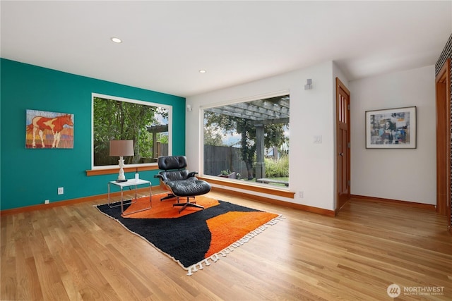 3754 SW 107th St, Seattle, WA 98146 - sitting room with wood finished floors, baseboards, and recessed lighting