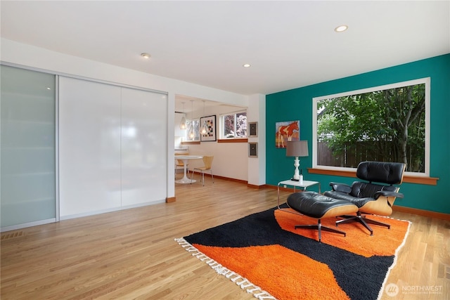 3754 SW 107th St, Seattle, WA 98146 - living area featuring wood finished floors, recessed lighting, and baseboards