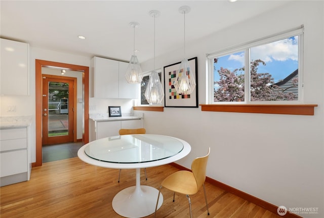 3754 SW 107th St, Seattle, WA 98146 - dining area featuring light wood finished floors, healthy amount of natural light, baseboards, and recessed lighting