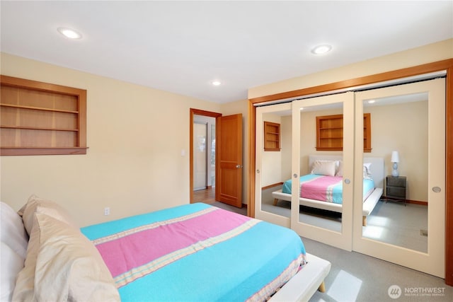 3754 SW 107th St, Seattle, WA 98146 - bedroom with french doors, a closet, recessed lighting, and light carpet