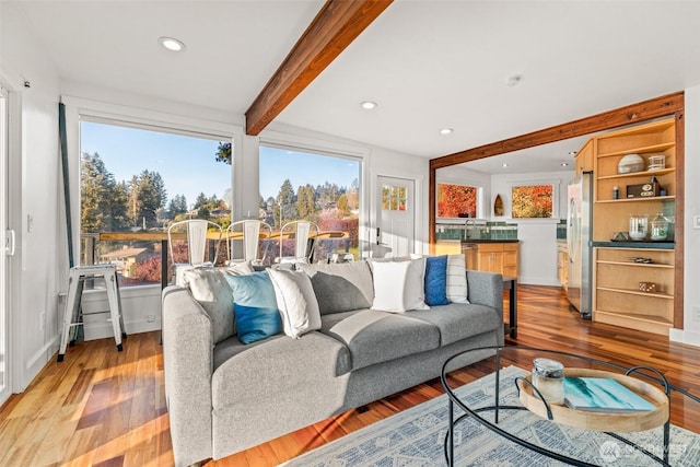 4425 Paradise Ave W, University Place, WA 98466 - living room featuring light wood-style floors, beamed ceiling, baseboards, and recessed lighting