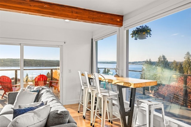 4425 Paradise Ave W, University Place, WA 98466 - sunroom / solarium with a water view, wood finished floors, healthy amount of natural light, beam ceiling, and baseboards