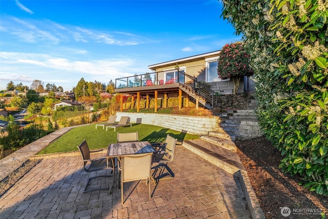 4425 Paradise Ave W, University Place, WA 98466 - back of house featuring stairs, a patio area, a deck, a yard, and outdoor dining area