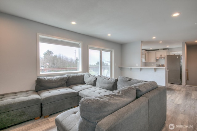 33 4th Ave, Ocean Shores, WA 98569 - living room featuring light wood finished floors and recessed lighting