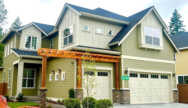 6414 213th Avenue Ct E, Bonney Lake, WA 98391 - view of front facade featuring a garage, board and batten siding, and roof with shingles