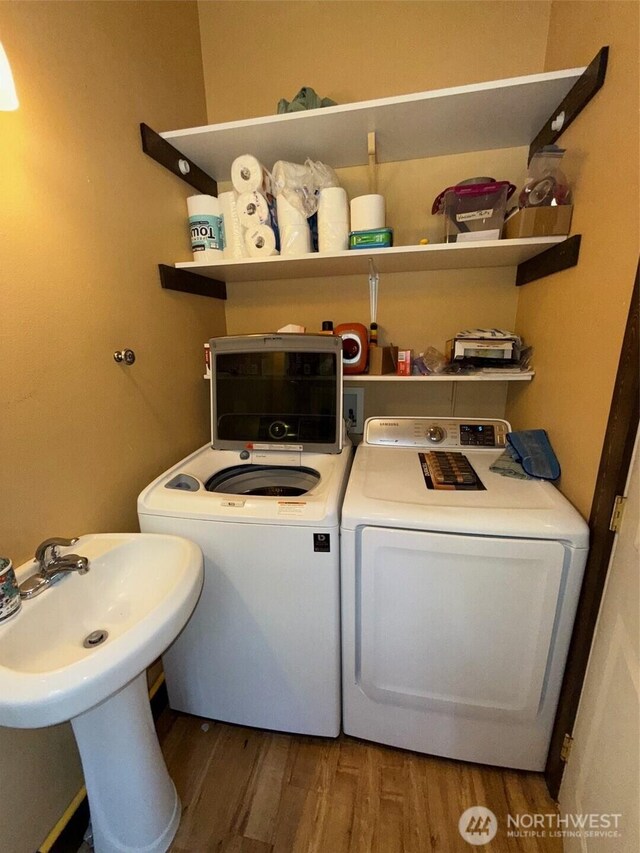 21 Twin Lakes Dr, Winthrop, WA 98862 - washroom with wood finished floors and washer hookup