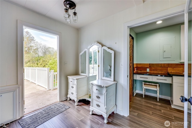 entryway with wood finished floors