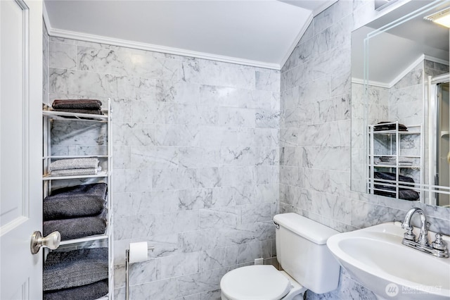 8494 NE Odd Fellows Rd, Bainbridge Island, WA 98110 - bathroom with tile walls, vaulted ceiling, a sink, toilet, and ornamental molding
