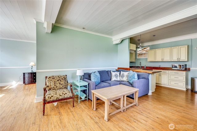 living area with crown molding, a chandelier, baseboards, wooden ceiling, and light wood-type flooring
