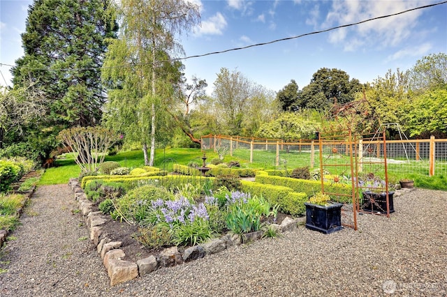 view of yard with fence