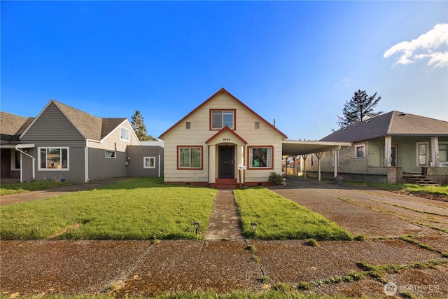 2824 Pacific Ave, Hoquiam, WA 98550 - view of front of property featuring concrete driveway, crawl space, a front yard, and a carport
