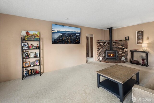 2824 Pacific Ave, Hoquiam, WA 98550 - carpeted living room featuring a wood stove