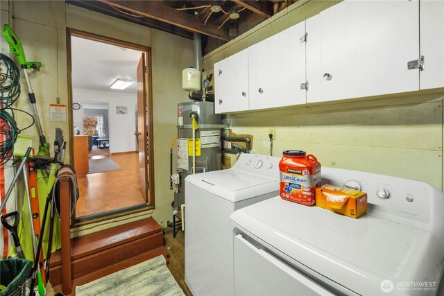 2824 Pacific Ave, Hoquiam, WA 98550 - washroom with water heater, washer and clothes dryer, and cabinet space