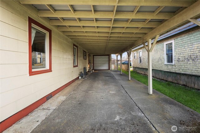 2824 Pacific Ave, Hoquiam, WA 98550 - view of patio with an attached carport and driveway