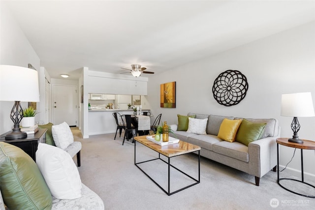130 NE 95th St Unit A203, Seattle, WA 98115 - living room with ceiling fan, light carpet, and baseboards