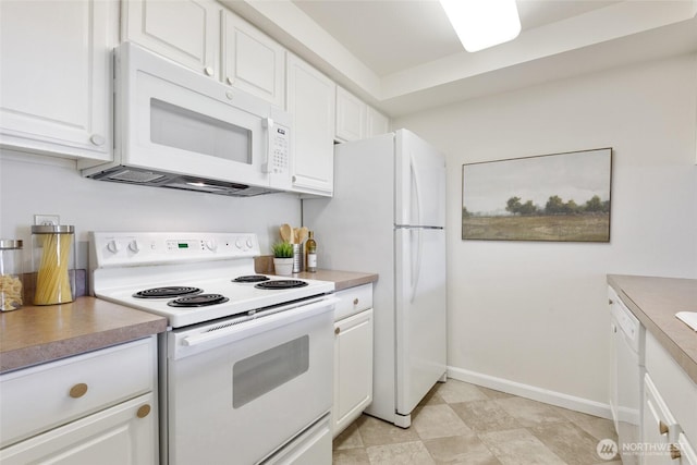 130 NE 95th St Unit A203, Seattle, WA 98115 - kitchen with light countertops, baseboards, white cabinets, and white appliances
