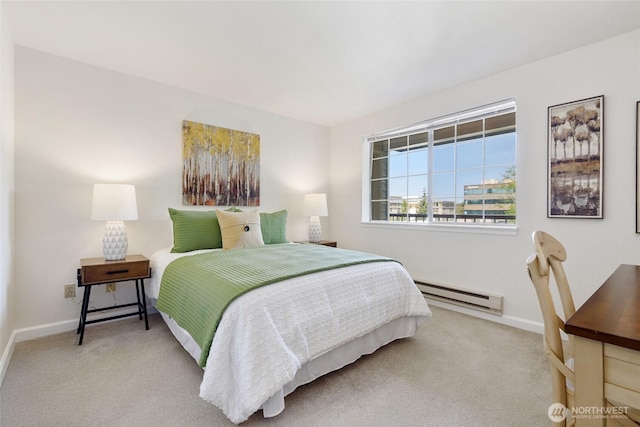 130 NE 95th St Unit A203, Seattle, WA 98115 - carpeted bedroom featuring baseboards and a baseboard heating unit